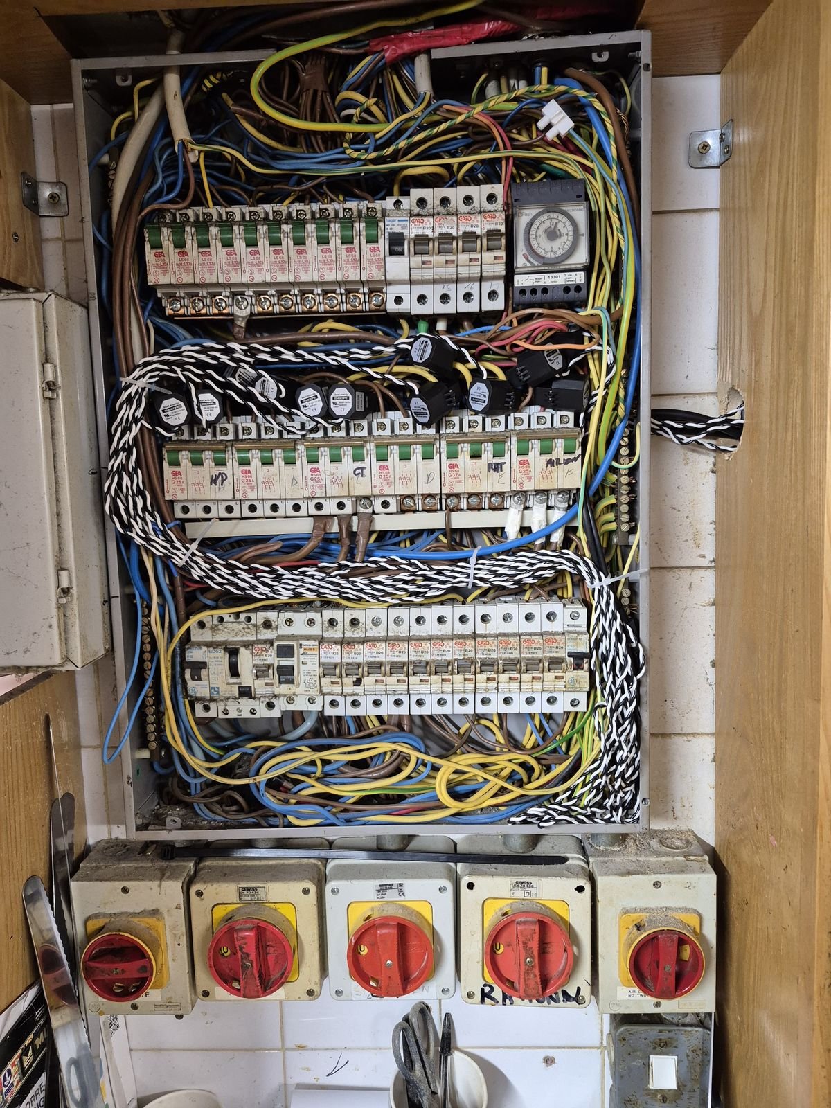 Distribution board with rotary isolators, installed by Elececo Engineering
