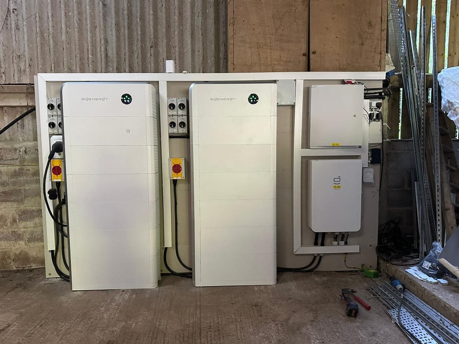 Sigenergy battery bank and inverters installed outdoors, by Elececo Engineering