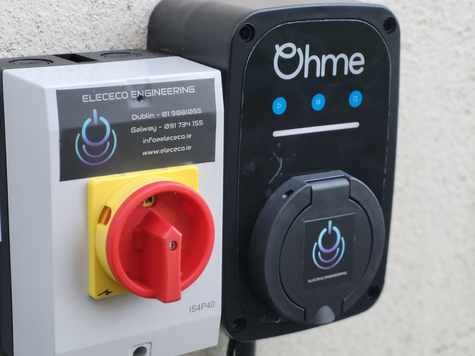 Ohme EV charger installed with a dedicated isolator switch, by Elececo Engineering