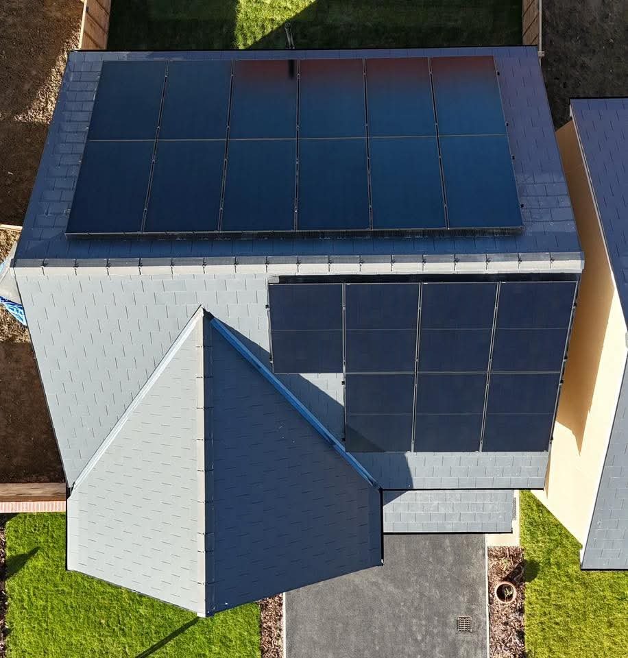 Aerial view of Solar PV panels on a slate roof, by Elececo Engineering